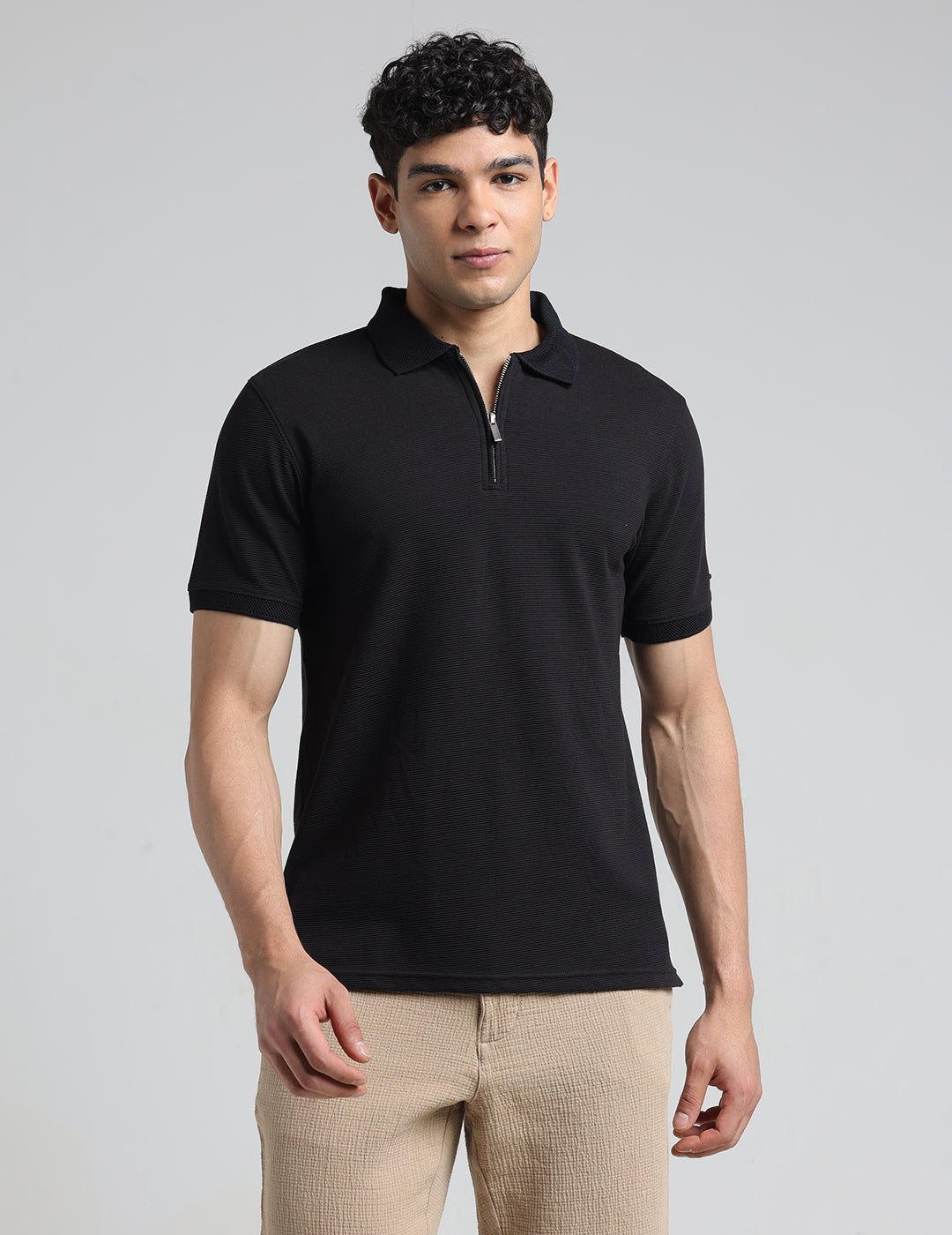 IDENTITI Men Slim Fit Polo Collar Solid T-Shirt In Black.