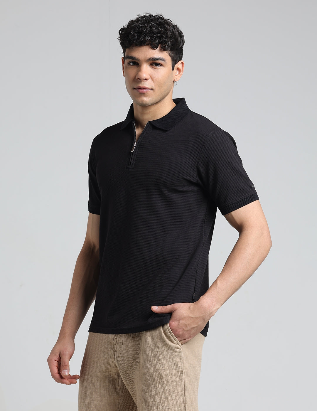 IDENTITI Men Slim Fit Polo Collar Solid T-Shirt In Black.