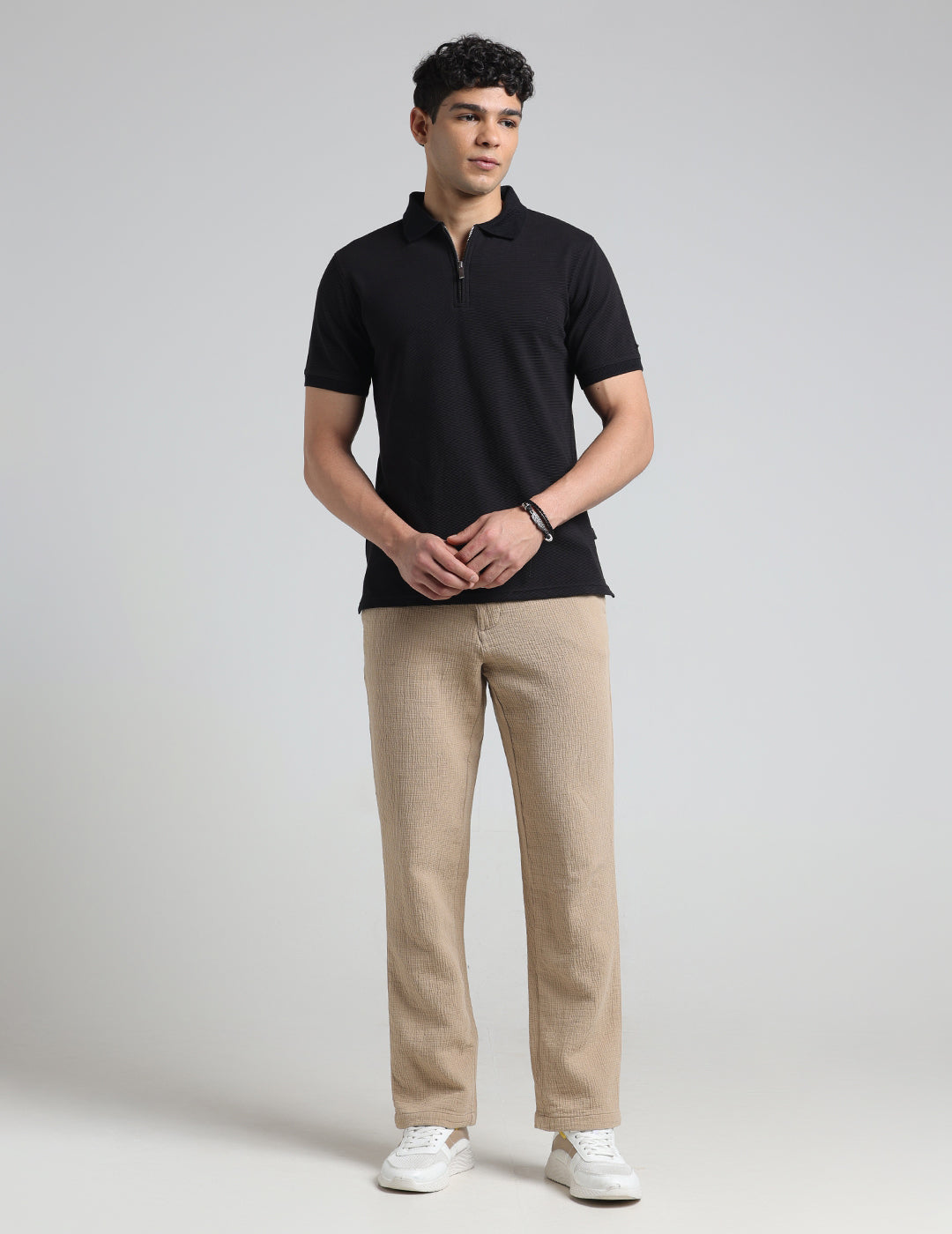 IDENTITI Men Slim Fit Polo Collar Solid T-Shirt In Black.