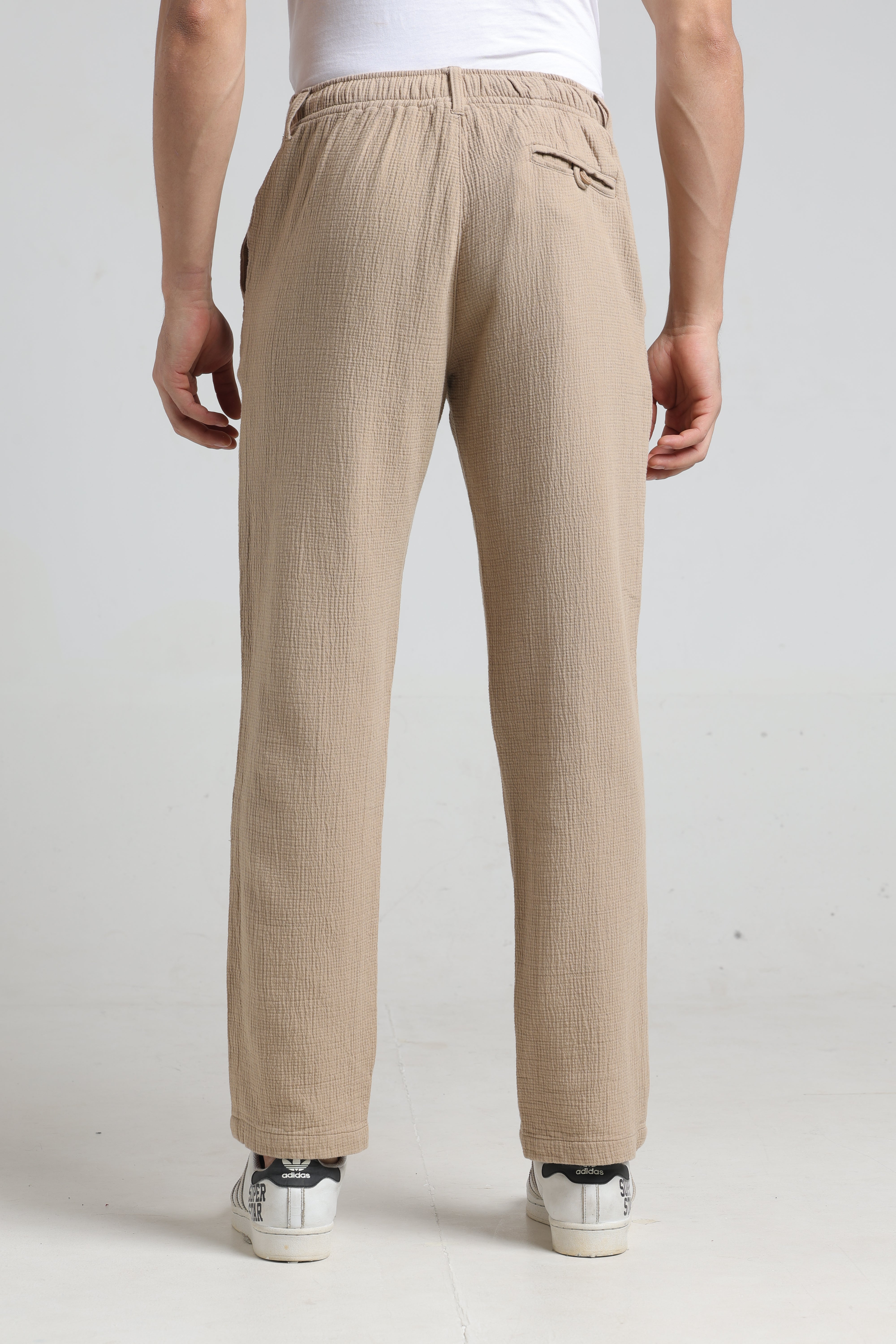 IDENTITI Men Relaxed Fit Non Denim Solid Trouser In Beige.