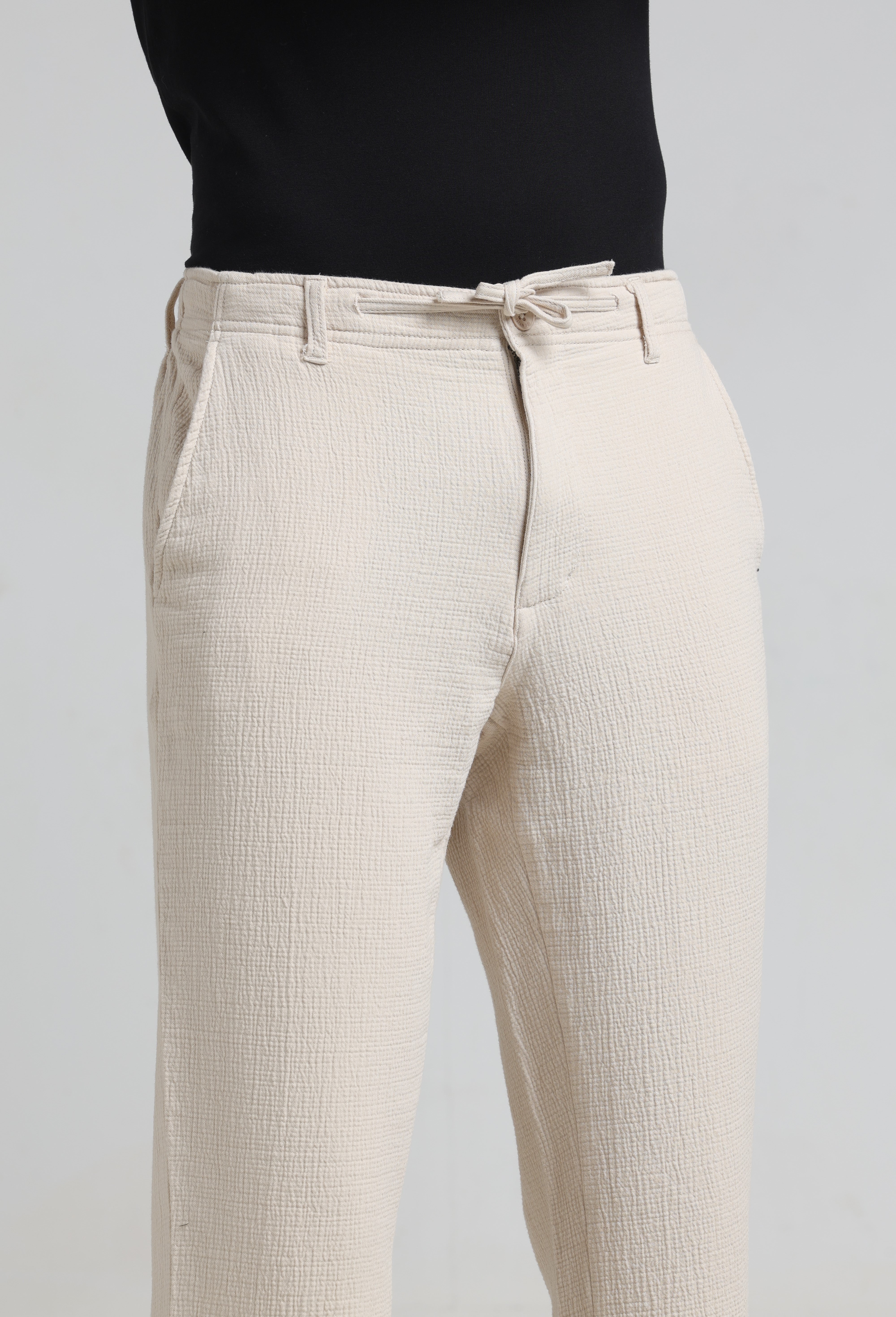IDENTITI Men Relaxed Fit Non Denim Solid Trouser In Ecru.