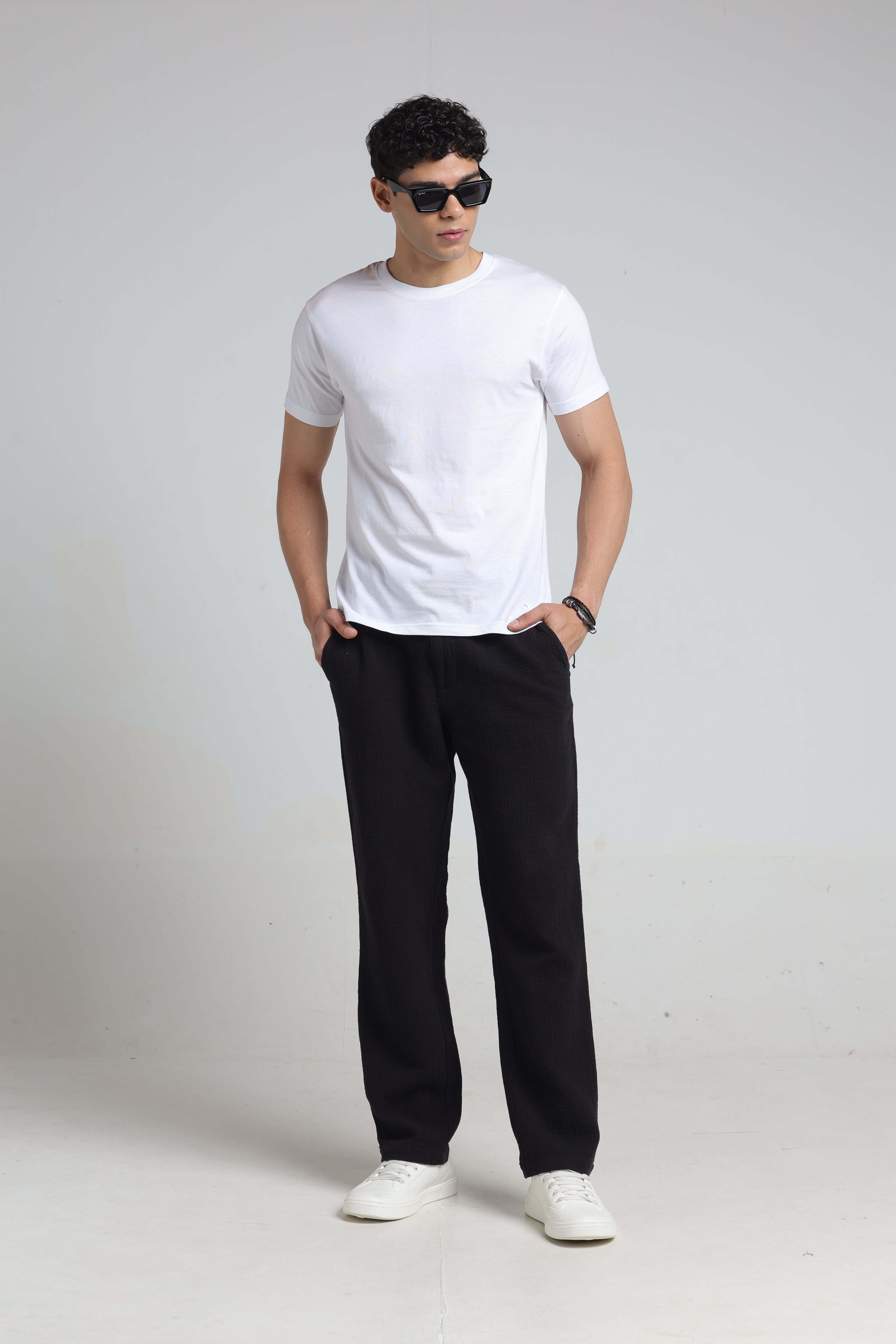 IDENTITI Men Relaxed Fit Non Denim Solid Trouser In Black.