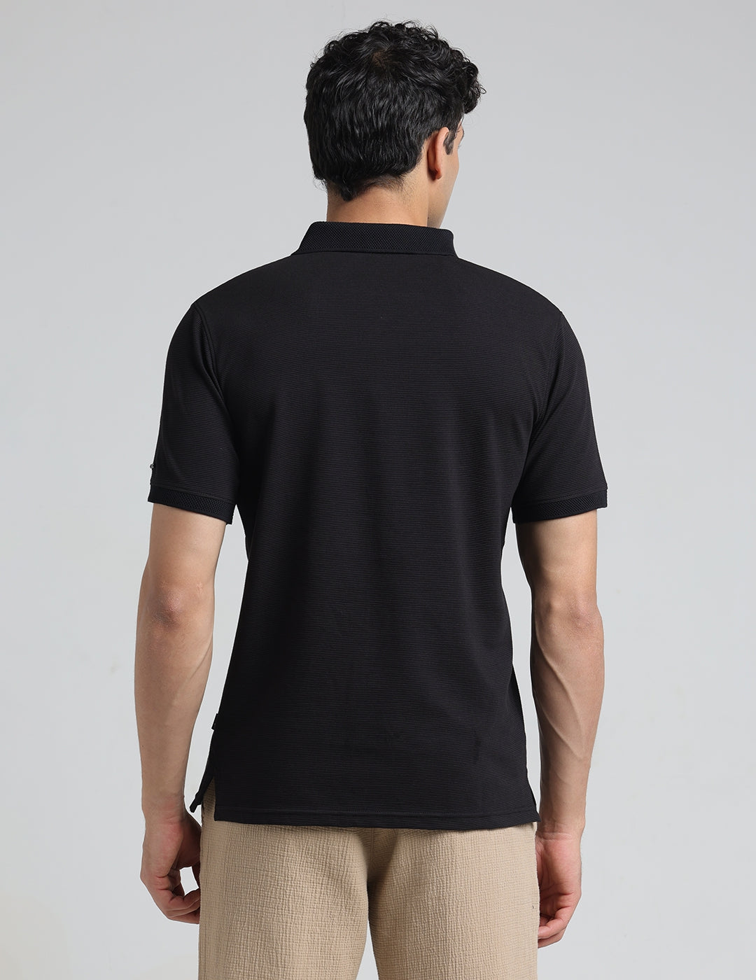 IDENTITI Men Slim Fit Polo Collar Solid T-Shirt In Black.