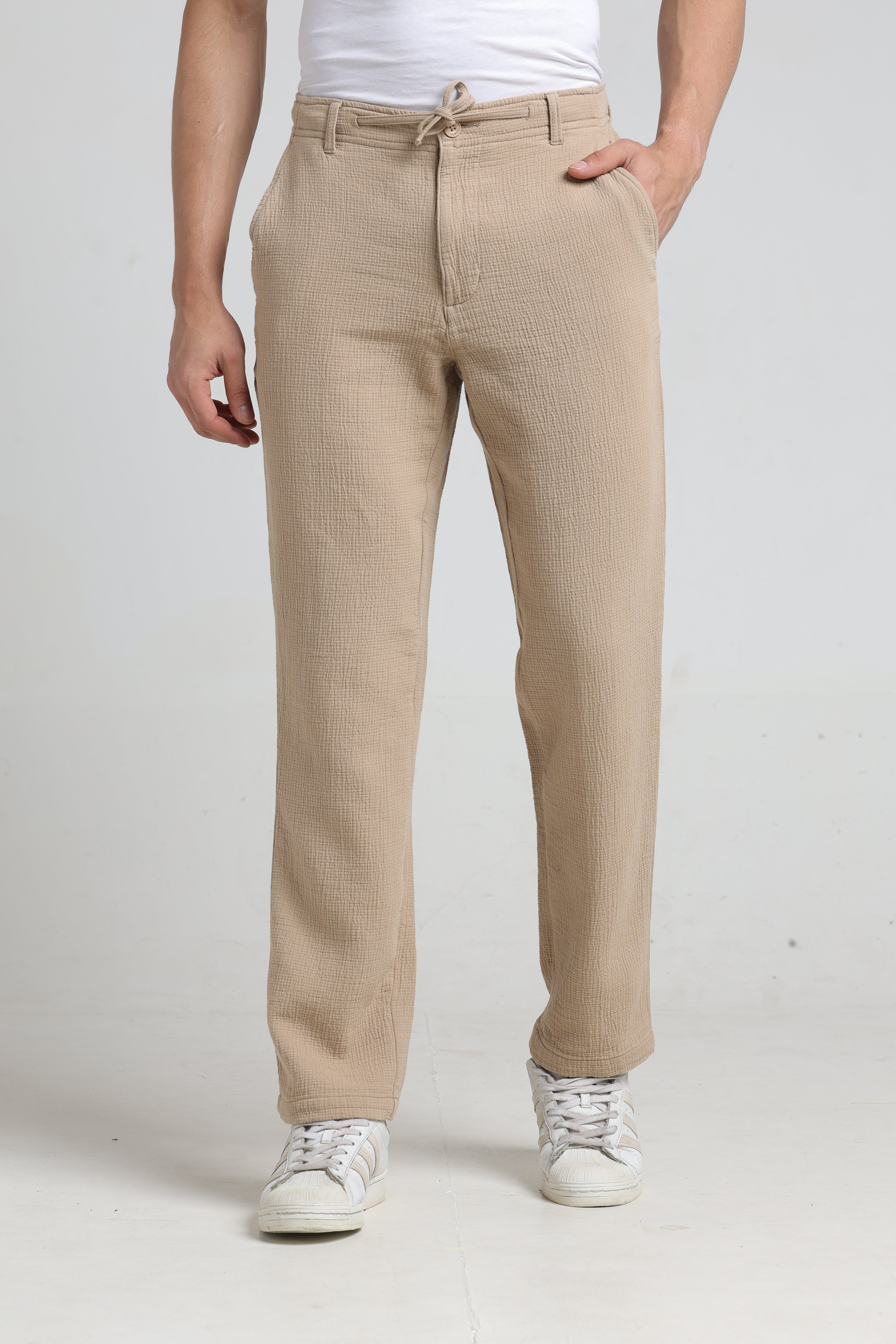 IDENTITI Men Relaxed Fit Non Denim Solid Trouser In Beige.