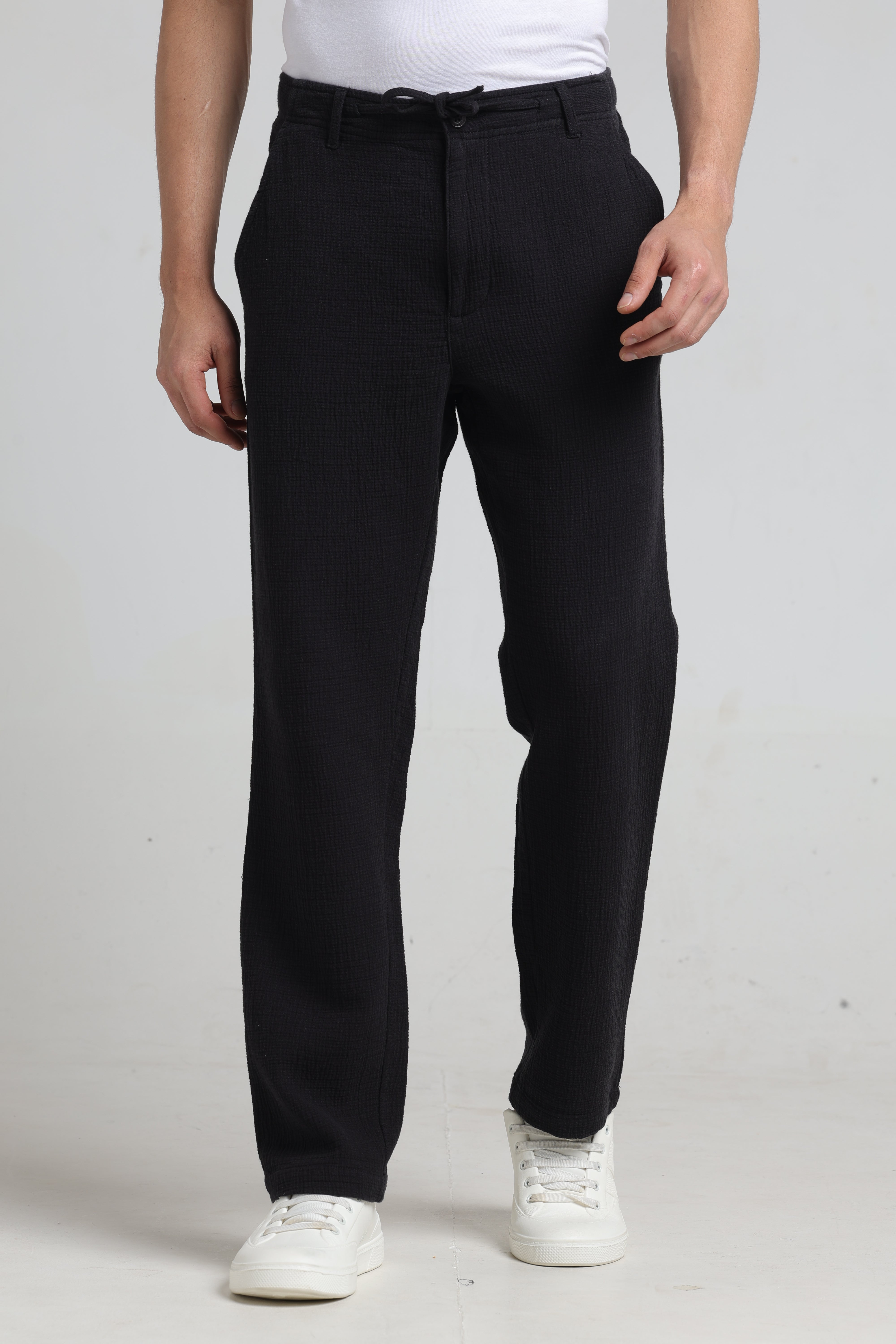IDENTITI Men Relaxed Fit Non Denim Solid Trouser In Black.
