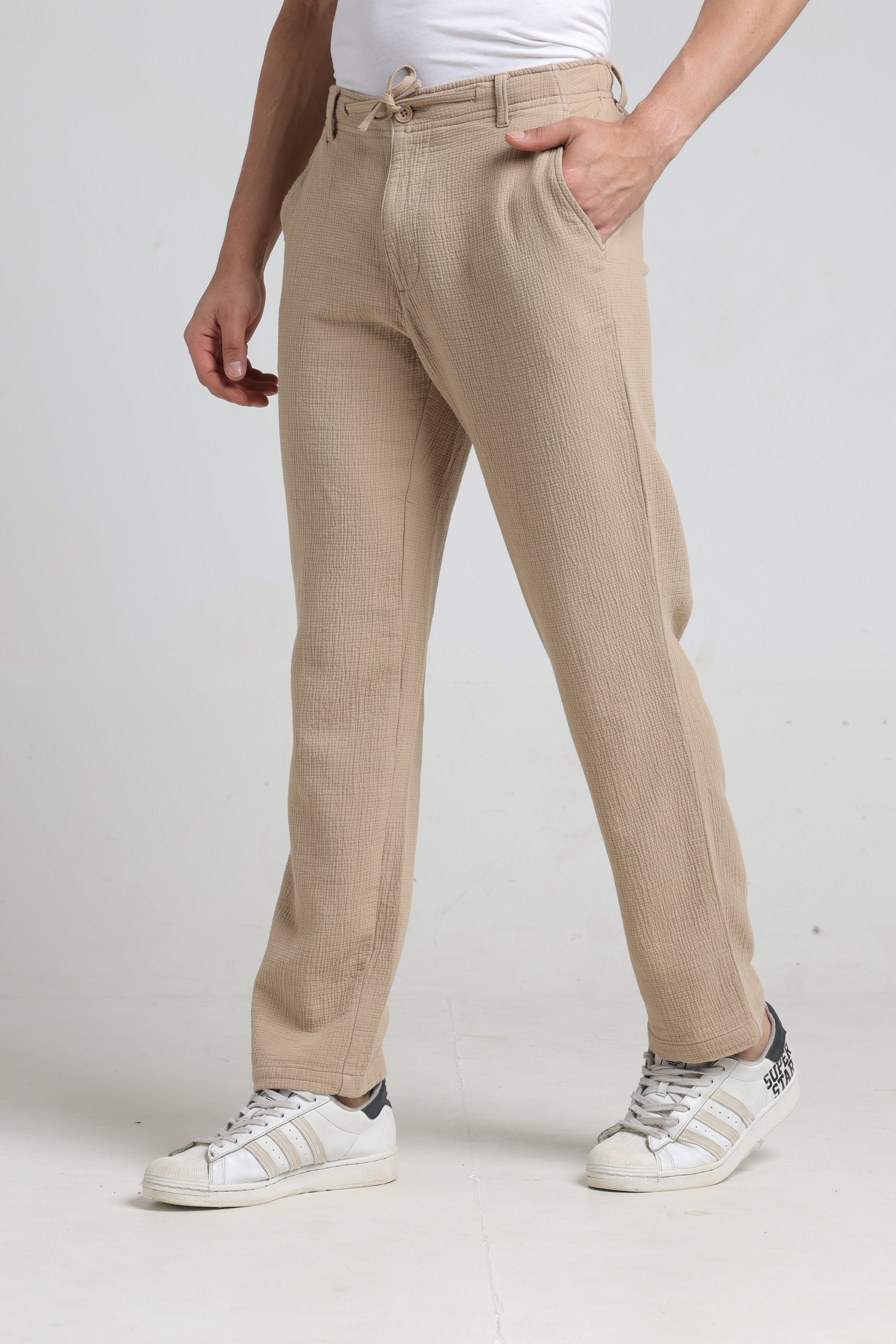 IDENTITI Men Relaxed Fit Non Denim Solid Trouser In Beige.