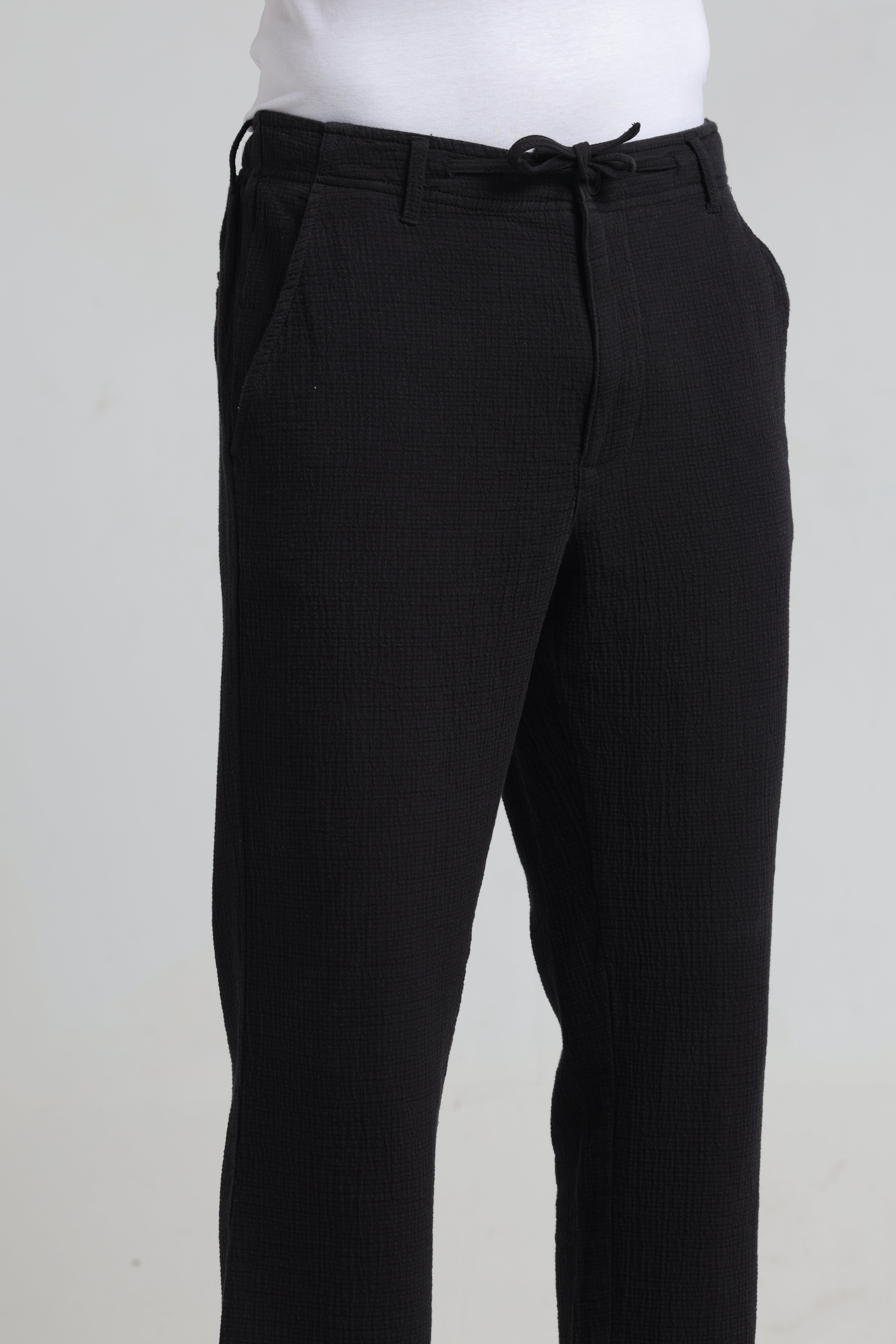 IDENTITI Men Relaxed Fit Non Denim Solid Trouser In Black.