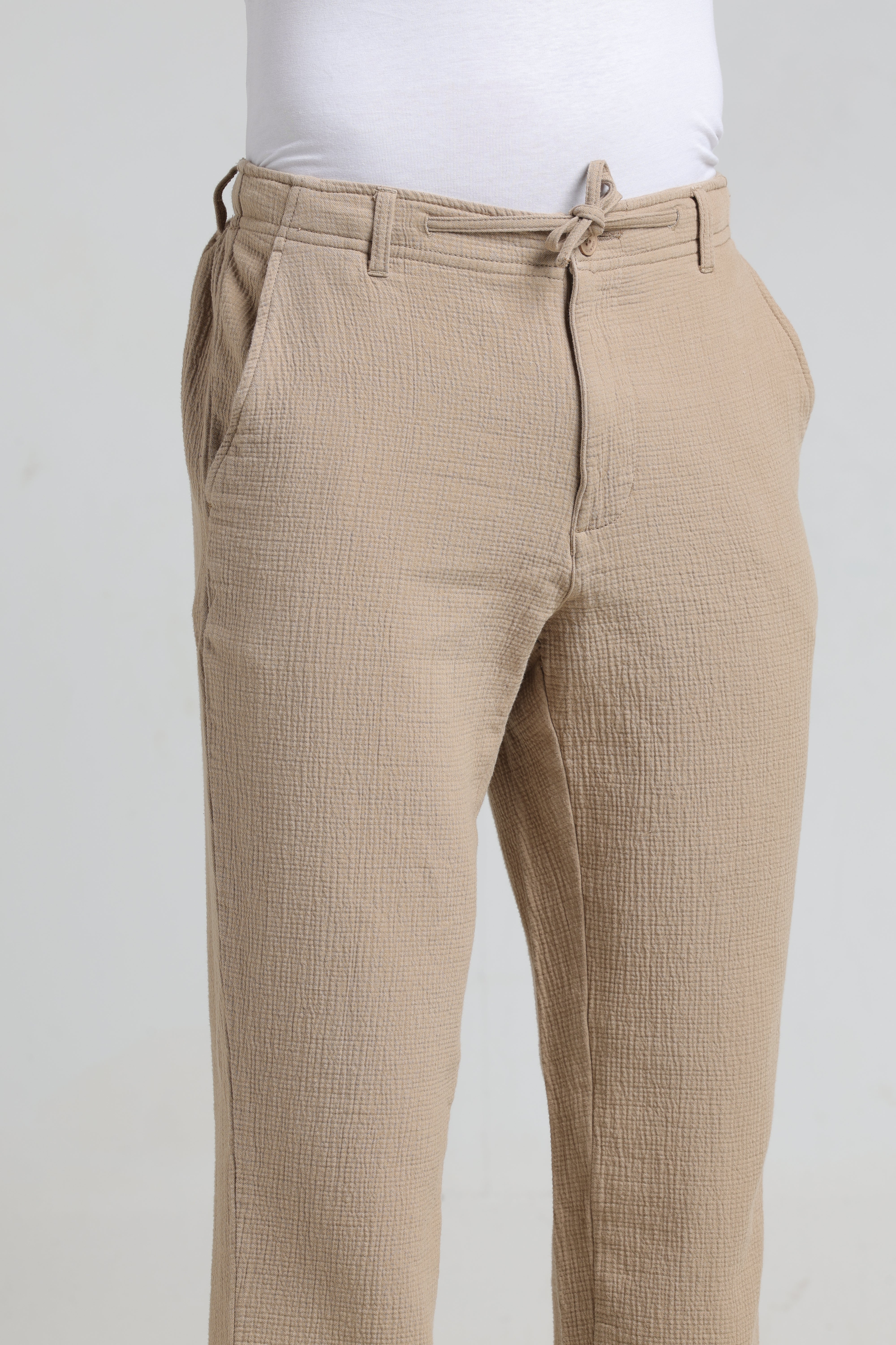 IDENTITI Men Relaxed Fit Non Denim Solid Trouser In Beige.