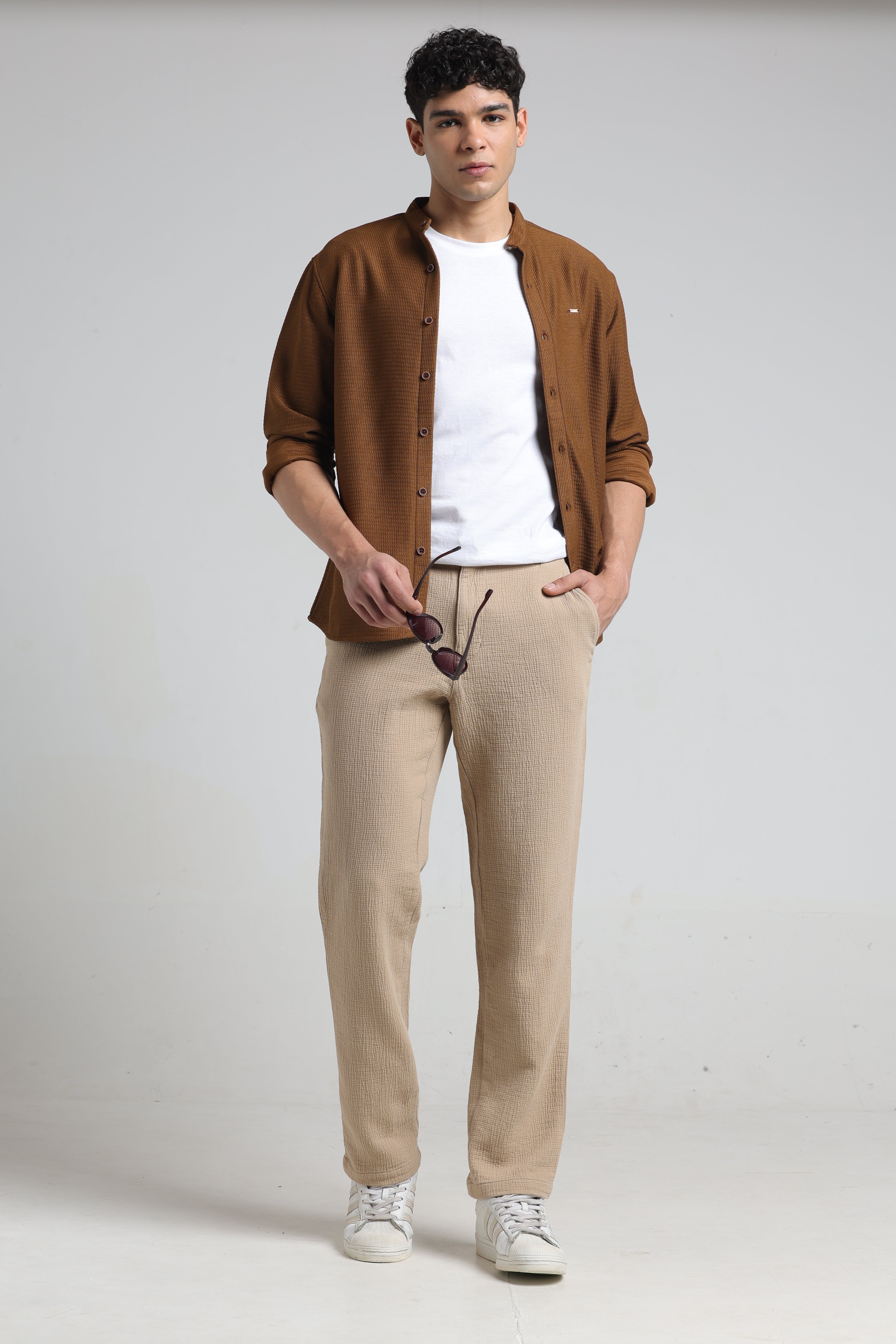 IDENTITI Men Relaxed Fit Non Denim Solid Trouser In Beige.